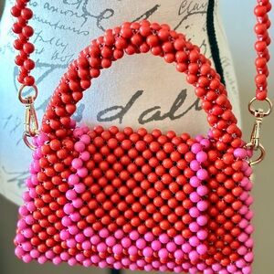 Kate Spade Beaded Red and Pink Handbag
Dress sold separately